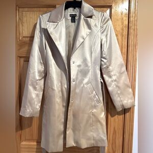 Gold satin jacket. Good condition. Slight imperfection